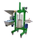 Fully electric press with grinder for extracting olive oil